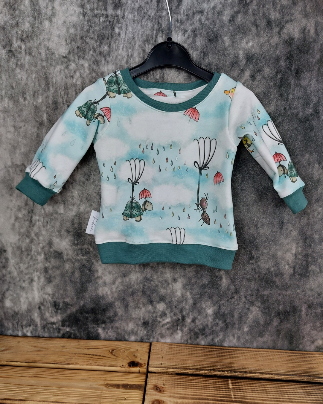 Sweater Gr.62 Wolkentiere