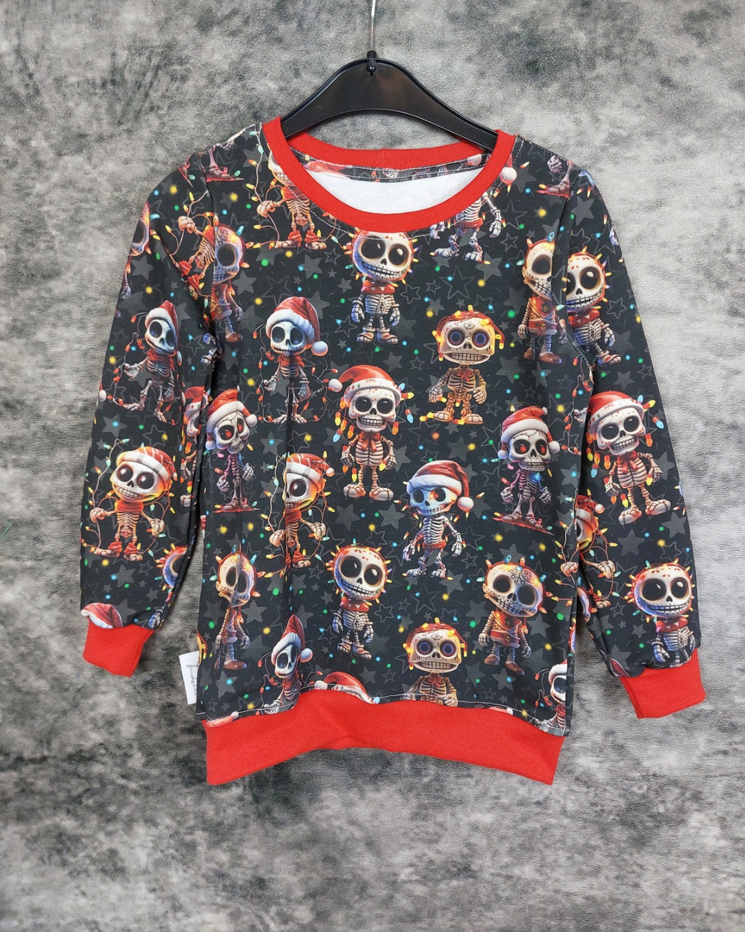Sweater Gr. 116 Weihnachtsskelette